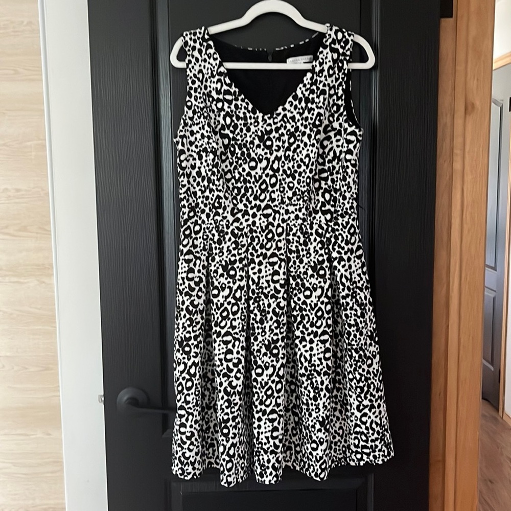 Black and white formal dress with pleated skirt